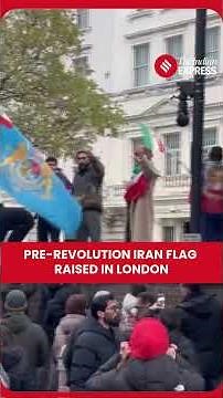 WATCH: Protester Raises Pre-Revolution Iranian Flag at London Embassy