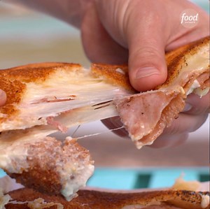 Cheesy ham croquettes turn an ordinary grilled cheese into something EXTRAordinary 🧀🧀 (Head to Ms. Cheezious to try it!) #ComfortFoodTour with The Grill Dads > Today at 2|1c | Food Network