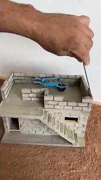 This Man Built a Tiny Model House