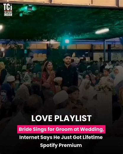 The Casual Indian 🇮🇳 on Instagram: "A wedding moment has gone viral after a bride sang a heartfelt song for her groom during the ceremony. Her nervous smile, steady voice, and pure emotion turned the performance into something deeply personal. Guests watched quietly as the groom soaked in the surprise, clearly moved. Online viewers joked that the groom has officially unlocked “Spotify Premium for life,” but many also praised the courage and love behind the gesture. Sometimes, the most unforget
