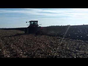 Plowing a harvested Corn Field with a Versatile 310 and International 7 bottom plow.