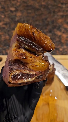 Oven Roasted & Reverse Seared 2 Ingredient Grass Fed Beef Short Ribs Ingredients: · Beef Short Ribs · Salt (for brining) Instructions: 1. Sprinkle salt generously over the beef short ribs, ensuring they are fully coated. Place the ribs in the refrigerator for 48 hours to allow for a thorough dry brining. 2. After 48 hours, take the ribs out of the refrigerator and let them rest at room temperature for 1 hour. 3. Preheat your oven to 500 degrees Fahrenheit. 4. Cut three layers of Heavy Duty Alumi