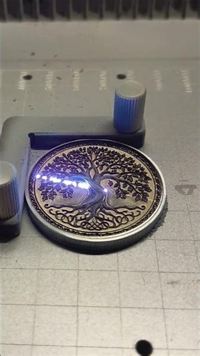 Tree of Life laser engraving on 40mm coin time lapse