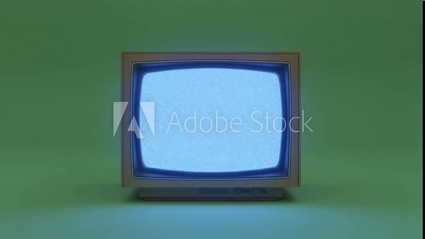 Vintage Television with Static: An old, square television set, its screen filled with static, evokes nostalgia for the analog era and the early days of broadcasting.