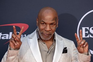 Man punched by Mike Tyson on plane demands $450,000. Lawyer says ex-champ won't pay 'shakedown'