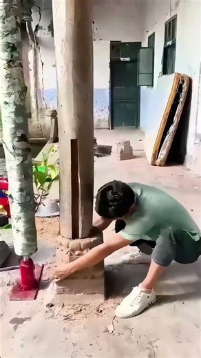 Restoring an Old House: The Intricate Process of Removing an Old Column Base