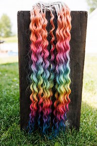Rainbow dreads with 3 different root colors - because your hair should be as bold and proud as you are! 🌈 Love how versatile these are. You can style them so many different ways depending on your mood. Perfect way to show your pride and express exactly who you are! ✨ Shop now: https://bit.ly/WCBDreads #dreadlocks #dreads #wavydreads #pridemonth #rainbowhair | Wildcrafted Beauty