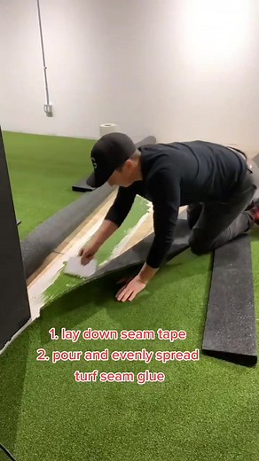 glueing a turf seam between 2 simulators! #turf #syntheticgrass #indoorgolf #golftiktok #fyp #foryou #simgolf @ken.c.long