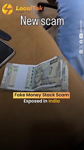 💵 Fake Money Stack Scam Exposed in India 😮 A video reveals a clever yet deceptive money scam in India 📍. Scammers stack Indian rupee notes so that the top and bottom bills are of higher denominations 💰 (₹500 or ₹2000), while the middle ones are of much lower value (₹100). This creates the illusion of a larger sum, exploiting the visual thickness of the stack 📏 and the prominence of the big-value notes. The trick has left many shocked ⚠️, serving as a reminder to always check every note care