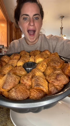 The best monkey bread! RECIPE: Grease a bundt pan. Take 2.5 cans of...