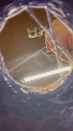 Spooling yarn and pulling from center of yarn ball