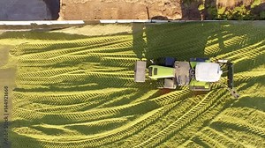 aerial of a tractor biogas plant in germany