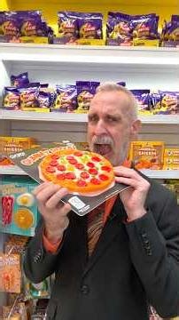 Rich guy critiques candy at the The Candy Room during their 10th Anniversary reopening