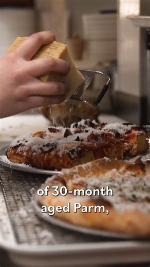 Any Stouffer's pizza fans out there? 🖐️ Wylie Dufresne is not your typical pizza-maker. The award-winning, fine dining chef-turned-pizzaiolo pushes the possibilities of traditional pies at Stretch Pizza in NYC. At this slice shop, you'll find soy sauce in the dough, smoked eggplant in the sauce, and Ritz crackers in the meatballs. | Eater