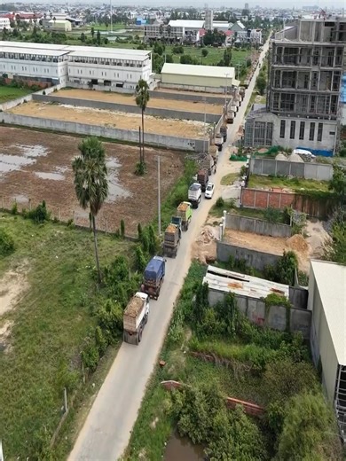 A remarkable project in progress, featuring expert teams and multiple trucks prepared for soil dumping #fblifestyle #bulldozer #construction #excavator | Excavator Cambodia I