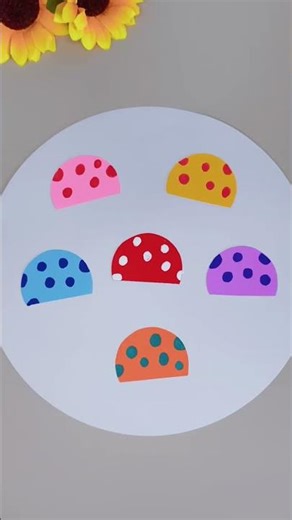 Spring is here. Use colored paper to cut a few semicircles to make cute colorful mushrooms. Crea