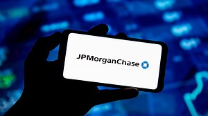 JPM stock falls as it boosts reserves by $6.8B