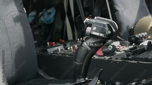 Control panel in military helicopter cockpit, copter dashboard with displays, dials, buttons, switches, faders, knobs, other toggle items, air force, modern aviation and aerospace industry