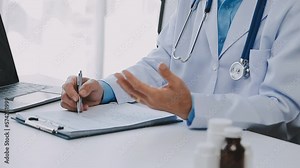 Close up of Female Doctor using stethoscope putting beat heart diagnose with patient in examination room at a hospital, check-up body, Medical and Health Care Concept.