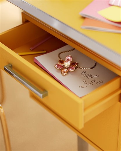 Precision cut petals, gold-toned hardware, and crystals in rich, seasonal shades. Our Idyllia pendant is autumn’s brightest flower. #Swarovski #SwarovskiIdyllia Shop now: https://swarovs.ki/TfxD | SWAROVSKI