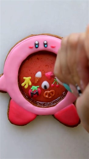 It's the Gameboy color cookie for me. Quite honestly the cutest cookies and pies I've ever seen, thanks @constellationinspiration! Get your copy of 'Blooms and Baking' here: https://amzn.to/3Ce8R9r ! We hope you love the products we recommend! Just so you know, BuzzFeed may collect a share of sales from any links in this video description. | BuzzFeed Video