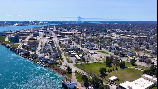Historic waterfront house aerial view on St. Clair River near Pine Grove Park and USCGC Sequoia coast guard ship, Port Huron, Michigan MI, USA.