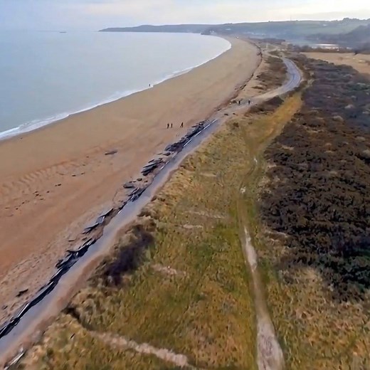 This aerial video of the seafront road at Slapton in the South Hams shows the full extent of the damage caused by Storm Emma. The A379 which separates the sea and the shingle beach from the world-famous nature reserve at Slapton Ley was partly washed away. Easterly gales and spring tides combined to cause widespread damage all along the South Devon coast. Thank you Sebastien Coell for the video, and you can see more of his photography at www.scoellphotography.com or at his Facebook page Seb Coel