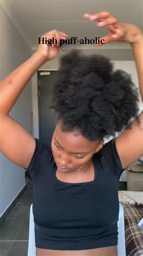 Natural Hairstyles: Mastering the High Puff