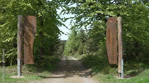 signpost along the Rothaarsteig hiking trail in the Sauerland and Siegerland close to Hilchenbach in Germany.