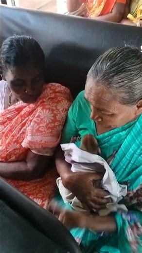 A woman carrying a monkey infant along with her which lost her mother & treating like her own baby 😍