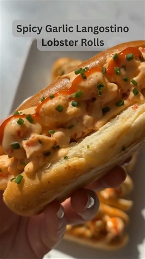 Spicy Garlic Langostino Lobster Rolls These Spicy Garlic Langostino Lobster Rolls are buttery, creamy, and packed with bold heat—perfect for when you want a restaurant-style seafood treat at home. 🦞 Ingredients 1 lb cooked langostino lobster meat, chopped 3 tbsp butter 4 cloves garlic, minced ½ cup mayonnaise 2 tbsp sour cream 1–2 tbsp sriracha (adjust to taste) 1 tbsp lemon juice Salt and black pepper, to taste 1 tbsp chopped fresh chives (plus more for garnish) 4–6 split-top hot dog buns Oliv