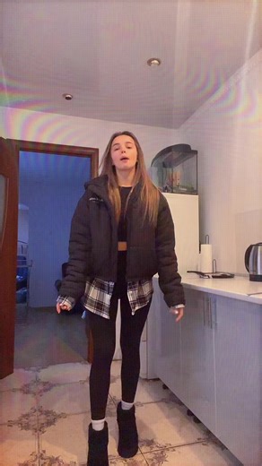 Dancing Moves in a Modern Kitchen Setting