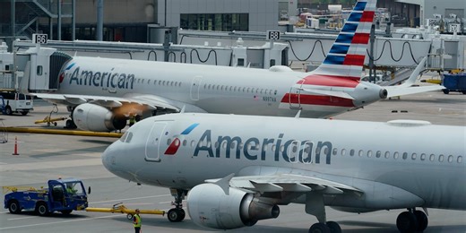 American Airlines passenger accused of kicking attendant restrained with zip ties, duct tape