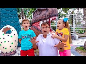 Diana and Roma learn about dinosaurs and play with different illusions at the Dubai Museum