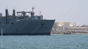 US Navy Supply-class Fast Combat Support Ship passes Coronado Naval Air Station as it departs San Diego Harbor