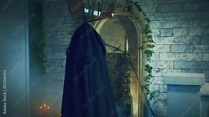 Mysterious silhouette vampire woman, view back, black Gothic vintage dress, cape hood on head. Girl turns, beautiful face brunette. Festive halloween makeup red bright lips, dark queen. throne room