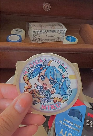 I used the parchment paper sticker method to turn this wrapper into a sticker 🥳🥳 quick and easy! #hatsunemiku #stickers #diystickers