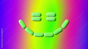 Vitamins or nutritional supplements on a bright colored background. Tablets are laid out in a smile. Animated video clip