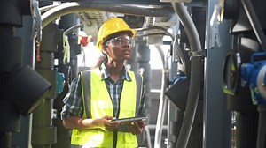 clip-1106682663-engineers-check-control-systems-proper-functioning-critical