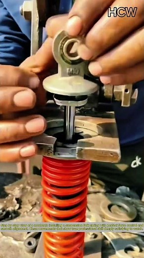 Watching a mechanic install a suspension fork spring: Precise, clean, and satisfying.