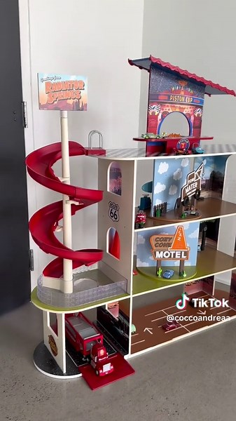 Transformed this doll house into my sons Radiator Springs paradise. Inspired by so many mamas on this platform who have done the same especially @Amanda ✨ and @skookiedoes go check out their diy’s as well! #dollhousemakeover #disneycars #boymom #hotwheels #lightningmcqueen