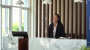 clip-1074174398-thai-receptionist-welcome-greeting-wai-hotel-thailand