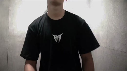 Muscular Male Model Poses in Aesthetic Setting