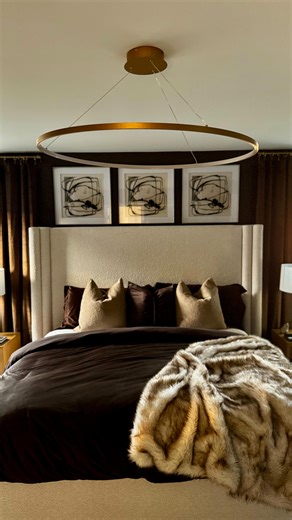 Kay the Designer on Instagram: "My clients envisioned a luxury oasis, blending rich textures and a monochromatic palette of brown, taupe, and gold. From bouclé and satin fabrics to custom wall paneling, every detail adds depth and sophistication 😍✨ and to see how the natural lighting captures every detail is BREATH TAKING 😮‍💨. Gold accents and plush layers complete this high-end retreat. Shout out to @neighborhoodstampedrenovations once again for helping to bring this room to life with adding