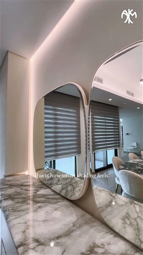 Where design meets control.Motorized zebra blinds for effortless elegance. #moderninteriors