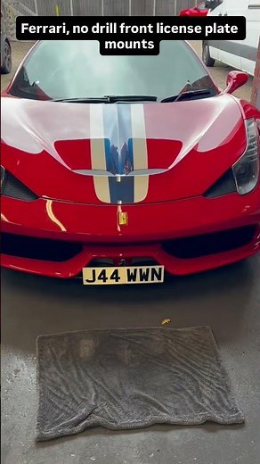 The only way to fit a front numberplate to your with no holes
