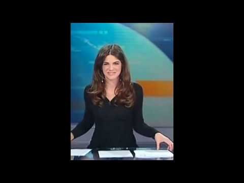 News presenter forgets she's sitting at a glass desk and unconciuslly shows her UW