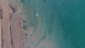 Oyster farm in Asnelles near Arromanches on the D-Day Landing beaches. Aerial vertical view