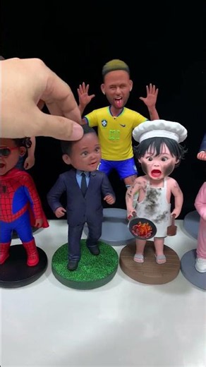 Handmade Clay Bobbleheads Dancing with Happy Energy