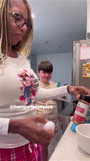 Good morning… and welcome to Cooking Breakfast for His Majesty RC 👑🍳 (flashback to last October) I’m in the kitchen trying to act like a normal human… RC walks in half asleep in his pajamas acting goofy… I’m being silly… he’s being silly… so basically nothing has changed 🤣 This boy is addicted to Hitman bacon 🥓 and had me using Hanger Bay seasoning in his eggs because “Mom, it tastes better” — and he was NOT wrong. Laughing, cooking, seasoning everything extra, and making memories in the kit